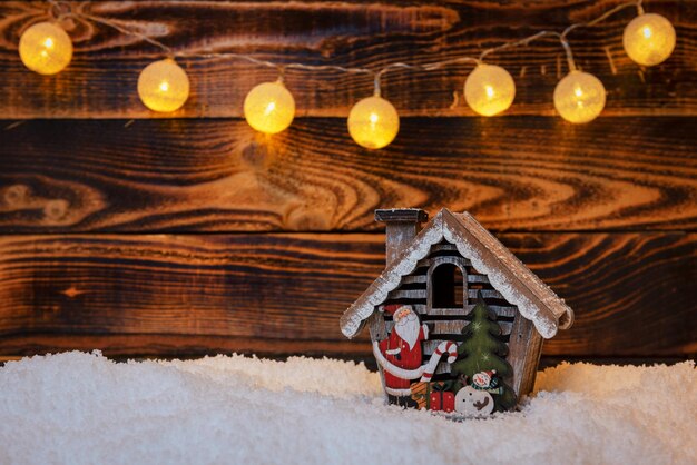 Photo illuminated christmas lights in snow