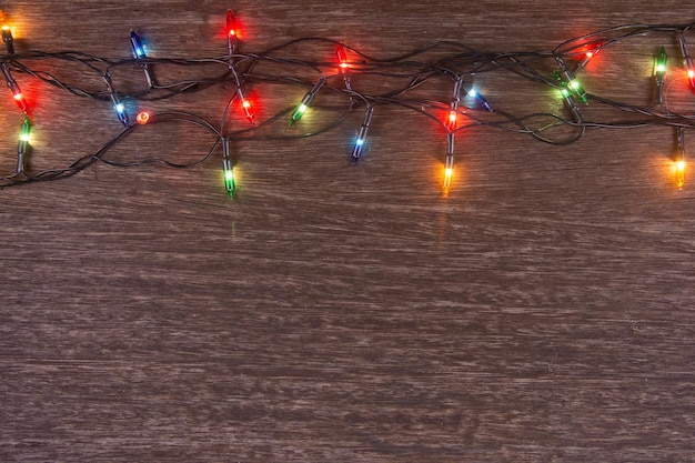 Photo illuminated christmas lights on street at night