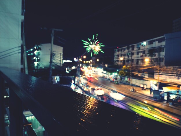 Photo illuminated city against sky at night