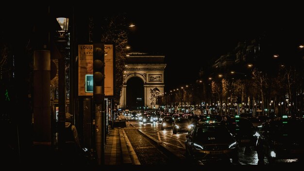 Photo illuminated city at night - steet of paris