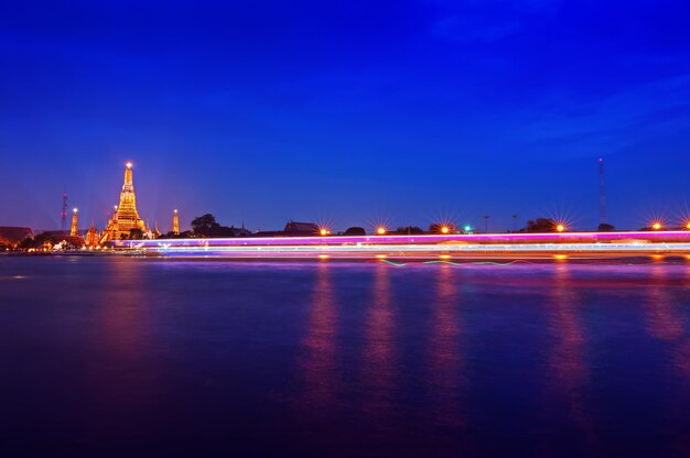 Illuminated city at waterfront