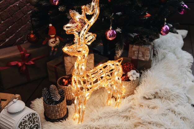 Photo illuminated decoration by christmas tree