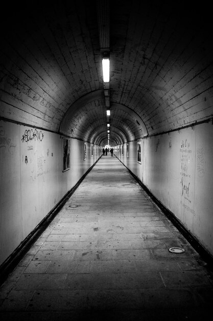 Illuminated empty subway tunnel