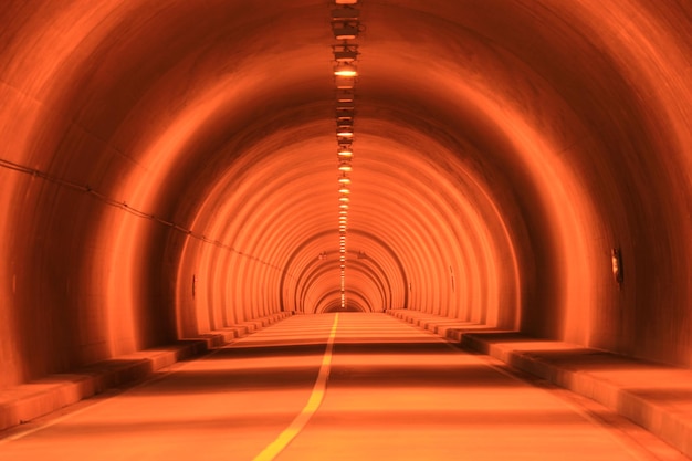 illuminated empty tunnel