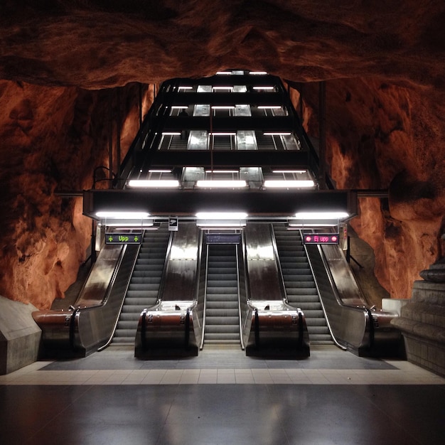 illuminated escalators at radhuset metro station
