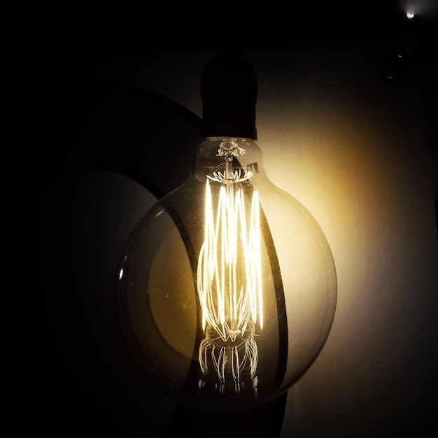 Illuminated lamp in dark room