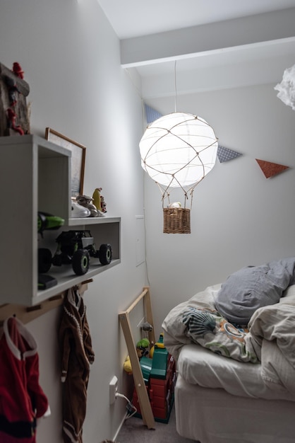 Photo illuminated lighting equipment hanging on wall at home