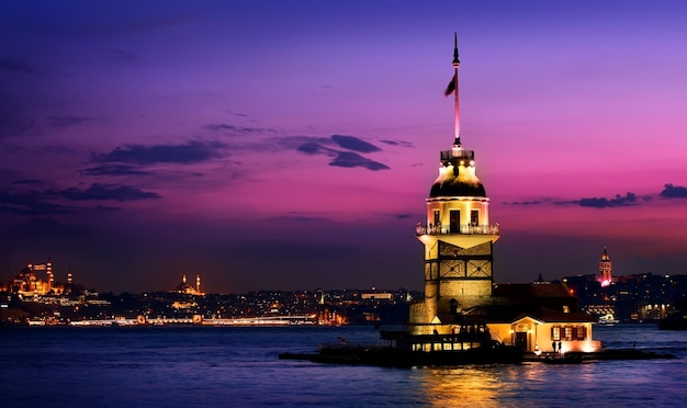 Illuminated Maiden's Tower in Istanbul on a background of purple sky, Turkey