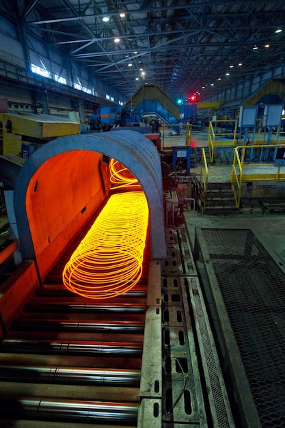 Illuminated metal on equipment in factory