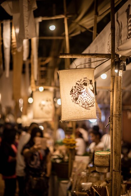 Illuminated pendant lights hanging at night