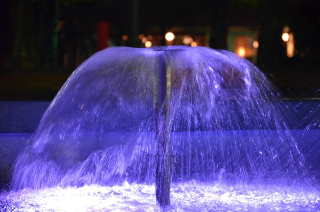 illuminated small fountain at night