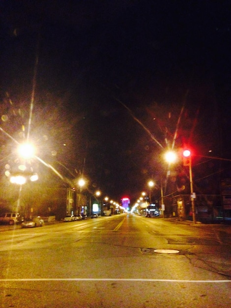 Illuminated street lights at night