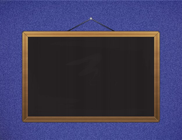 Photo illustration of black chalkboard with brown corners over jeans