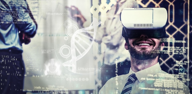 Photo illustration of dna against businessman using virtual reality headset in conference room