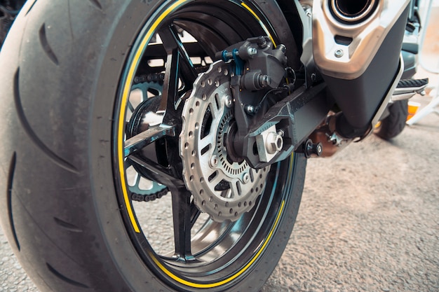 Photo illustration for sale of motorcycle wheels. motorcycle service concept.