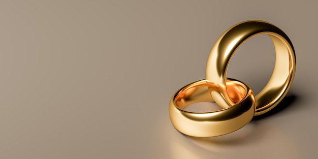 Photo illustration of two wedding gold rings with blank background unity concepts