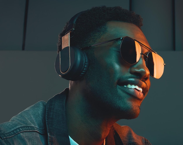 Im always in a mood a good one Studio shot of a man wearing headphones and sunglasses