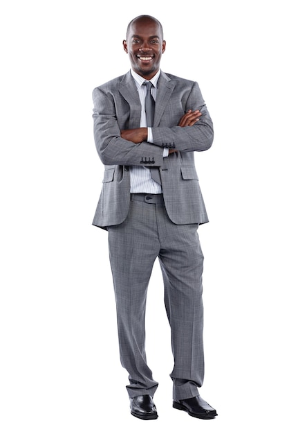 im good for business full length portrait of a businessman standing with his arms folded against a white background