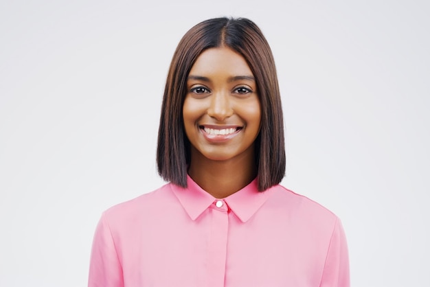 Im the happiest version of me Studio portrait of an attractive young woman smiling against a grey background