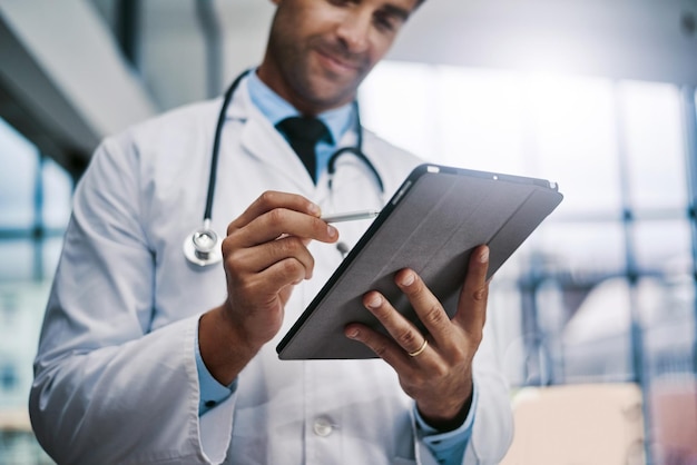 Im in healthcare because I care Cropped shot of a young male medical practitioner working in a hospital