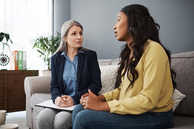 Im interested in hearing about your plans Shot of a young woman having a meeting with her advisor