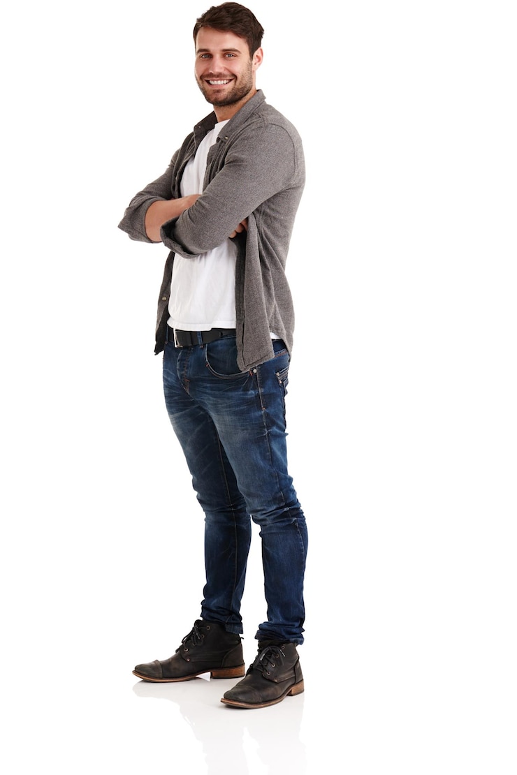 Photo im satisfied with my progress portrait of a young man standing with his arms crossed isolated on white