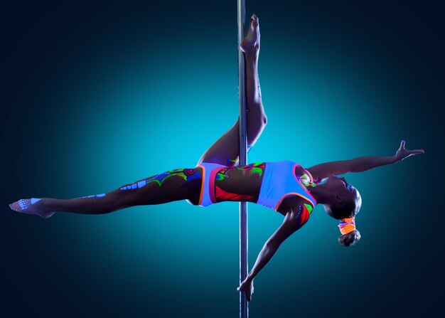 Photo image of amazing skinny girl dancing on pole