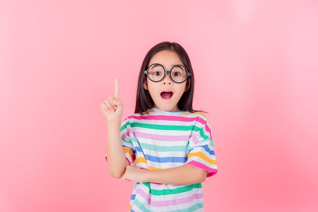 Image of Asian child posing on Pink background