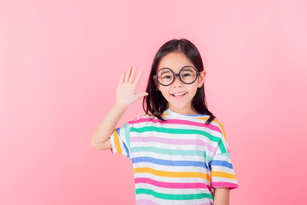 Image of Asian child posing on Pink background