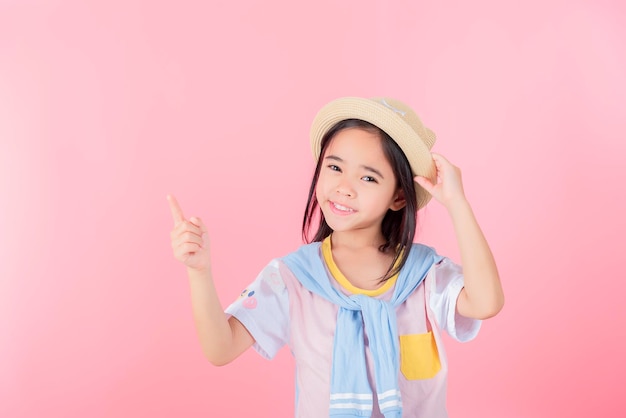 Image of Asian child posing on Pink background