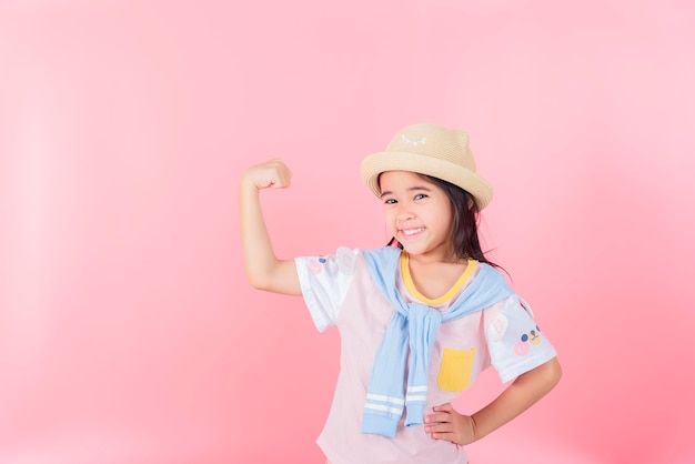 Image of Asian child posing on Pink background