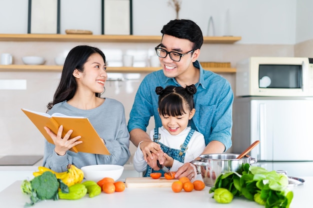 image of an asian family cooking at home