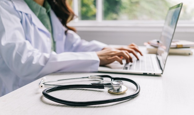 Image of Asian female doctor working at clinic