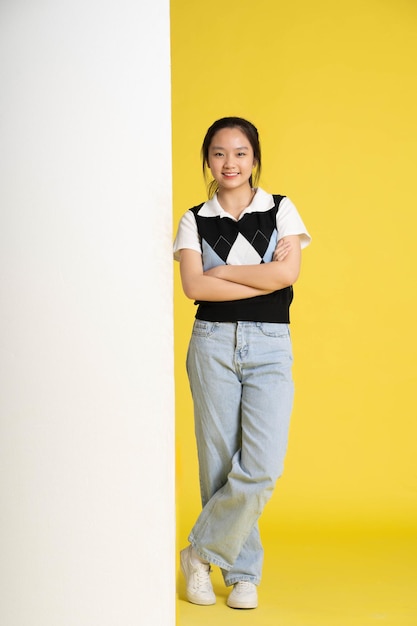 image of asian girl standing with billboard