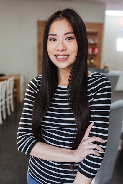 image of Asian woman in cafeteria