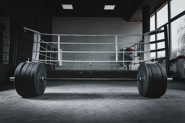 Image of barbell in the gym. The concept of sport and healthy lifestyle.