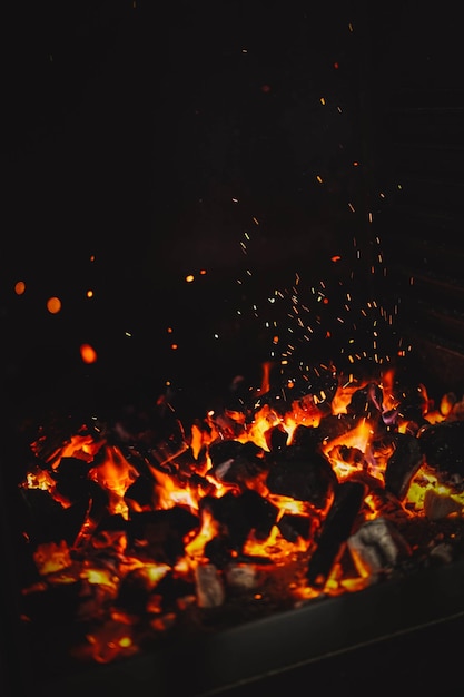 Photo image of burning coals in a restaurant grill