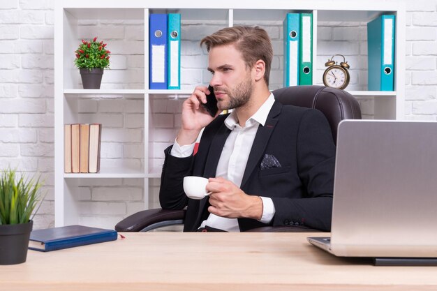 Image of businessman has phone talk businessman has phone talk isolated on white