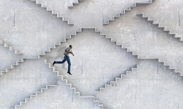 Image of businessman walking upstairs. Mixed media