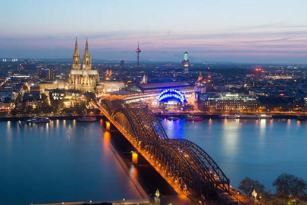Image of Cologne with Cologne Cathedral during twilight blue hour in Germany.