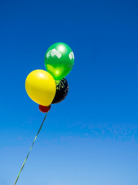 Image of colorful balloons with sky background