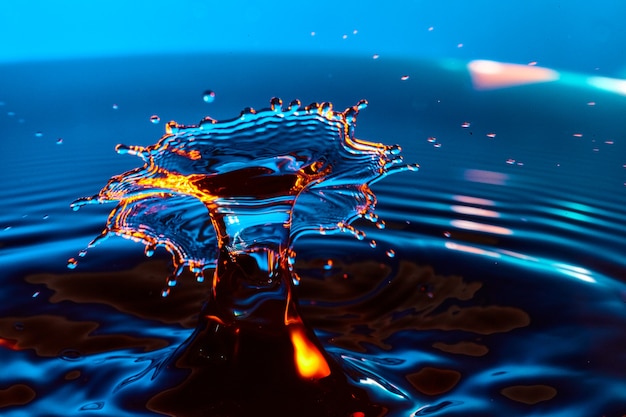 Image of Cosmic splash of deep blues and sunset oranges