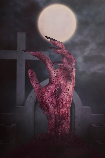 Foto immagine di una mano zombie insanguinata e inquietante con unghie lunghe che esce dal cimitero durante la notte buia