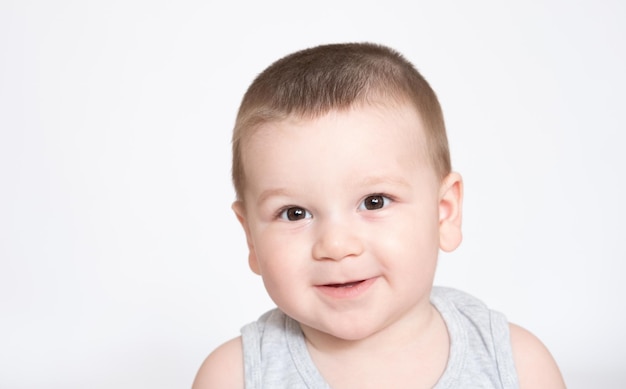 Image of cute baby boy closeup portrait of adorable child isolated on white background sweet toddler healthy childhood perfect caucasian infant lovely kid innocence concept