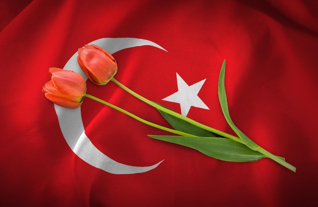image of festive flowers on the background of the flag of Turkey