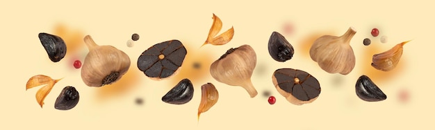 An image of flying black garlic Black garlic bulbs float in the air on a beige background Concept of healthy nutrition Fermented food vegetarian food Extra wide banner