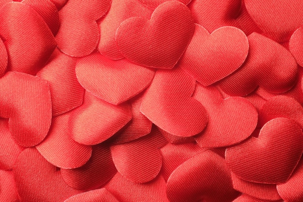 Image from above of a bunch of red hearts occupying the entire image