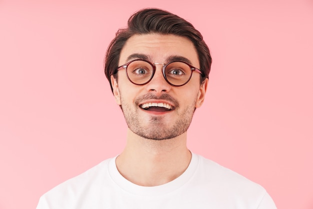 Photo image of funny caucasian man wearing eyeglasses smiling isolated