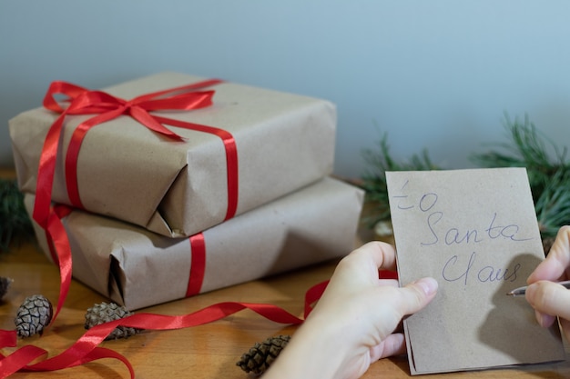 Image of the hands that make handmade gifts for Christmas. High quality photo