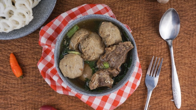 Image of Indonesian meat balls 'bakso homemade served in ceramic bowl Selective focus Flat lay concept